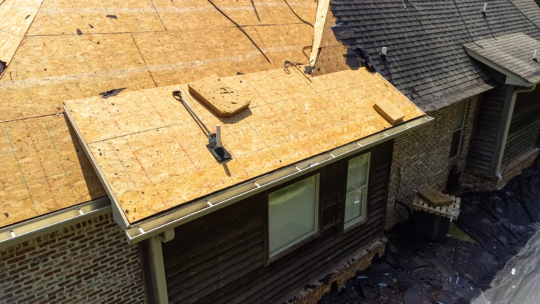 Aerial view of a shingle roof showing the ridge, valleys and vents