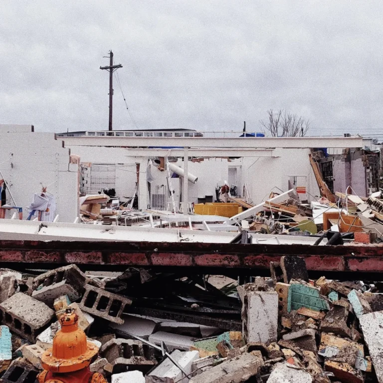 roof and houses in shambles after storm