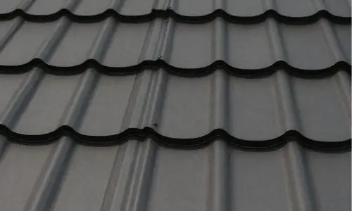 Durable metal shingle roof with modern finish by Daniel Hood Roofing Systems