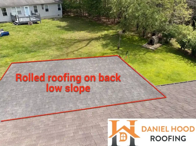 Low-slope rear roof section designated for rolled roofing installation to improve water protection in Crossville, TN.