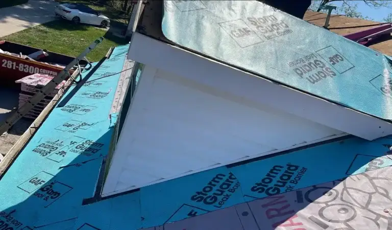 GAF StormGuard leak barrier installed around dormer walls for enhanced water protection.