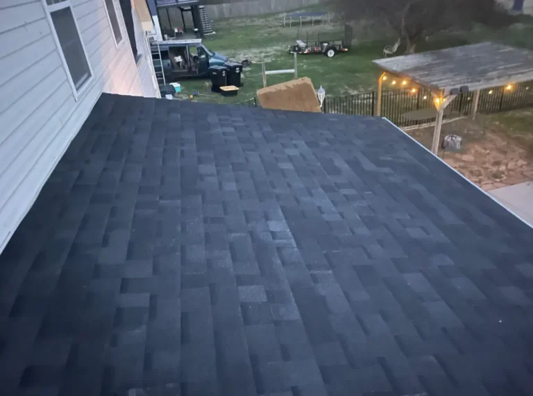Completed asphalt shingle installation on a porch roof as part of a residential roofing project by Daniel Hood Roofing.