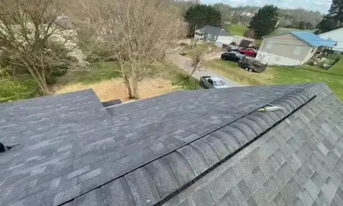 Completed roofing project with Oakridge gray shingles and upgraded ventilation