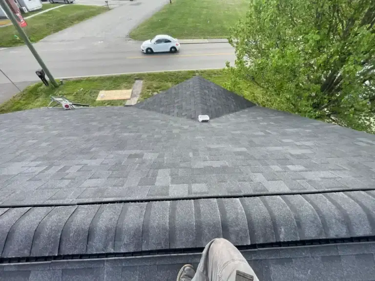 New gray architectural shingle roof installed with proper roof ventilation system