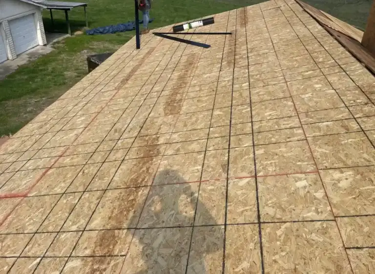 New roof decking installed and prepared for underlayment and shingle installation