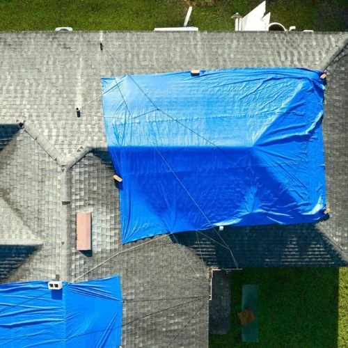 Daniel Hood Roofing providing Free Roof Tarping in Knoxville, TN to secure residential storm damage.