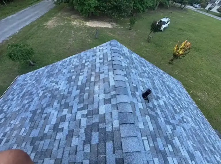 New architectural shingles and ridge cap system installed on a residential roof in Crossville, TN.