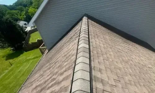 Roofing gallery featuring a completed asphalt shingle roof by Daniel Hood Roofing.