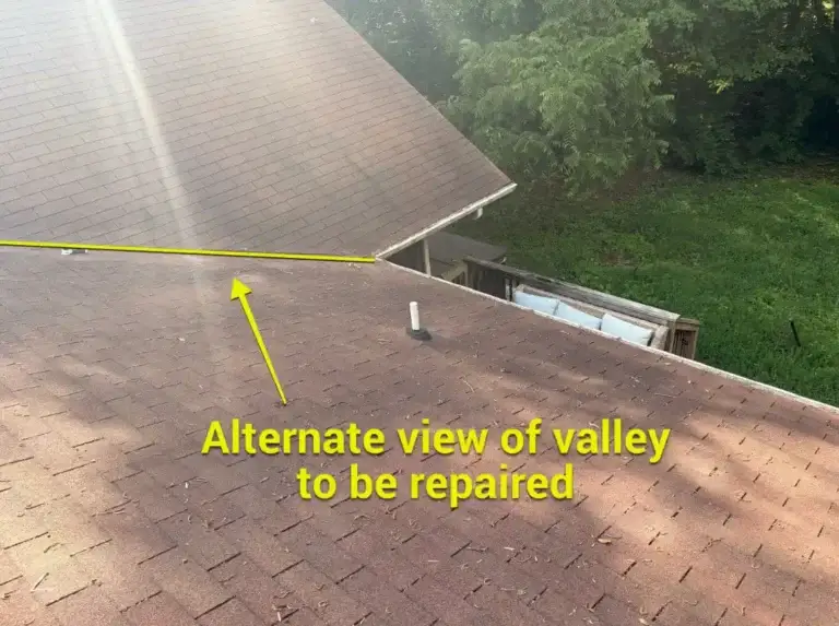Alternate view of the roof valley showing the section requiring moisture damage repairs.